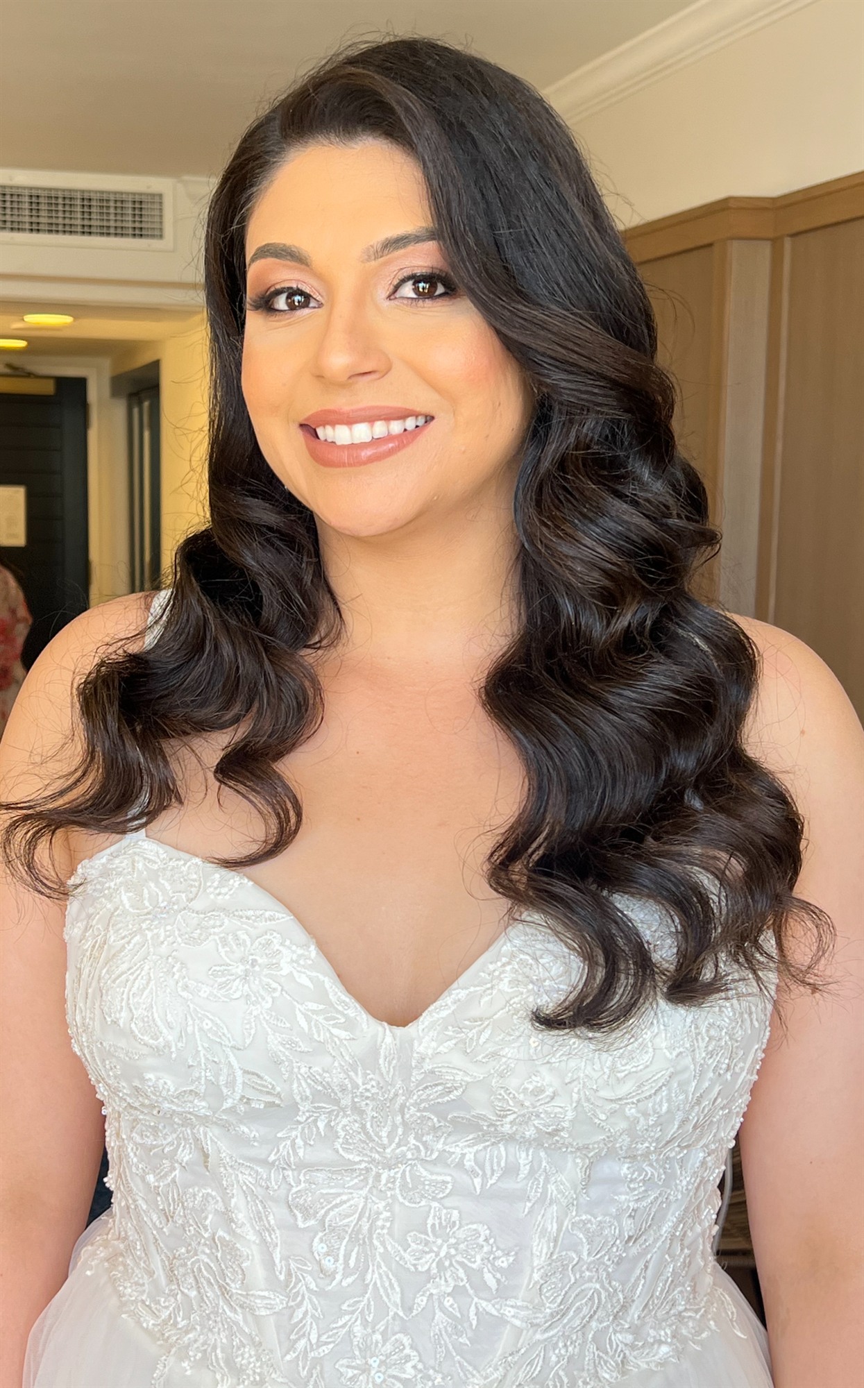 Close-up portrait of a bride's finished makeup look